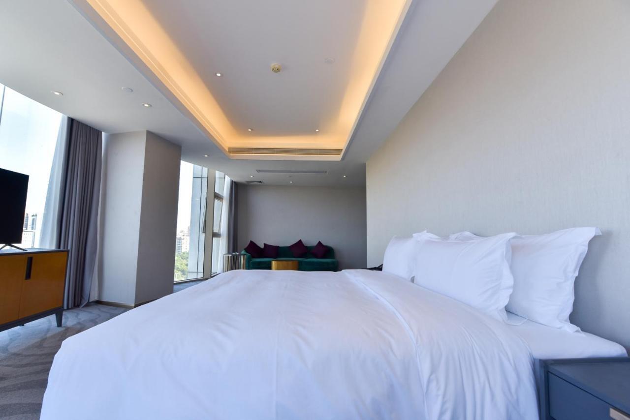 Ximala Business Hotel Guangzhou Exteriör bild
