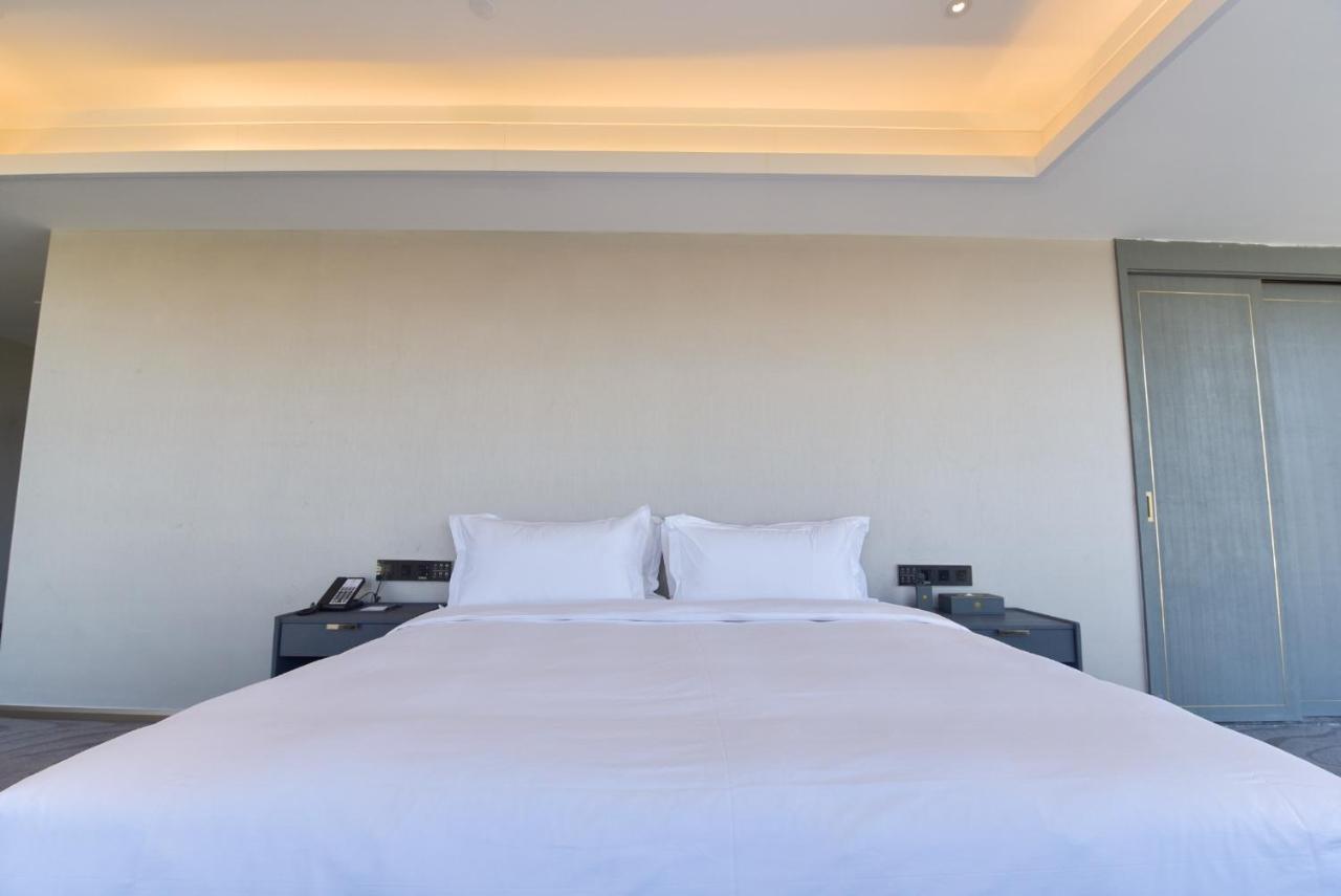 Ximala Business Hotel Guangzhou Exteriör bild