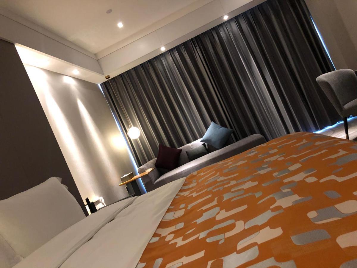 Ximala Business Hotel Guangzhou Exteriör bild