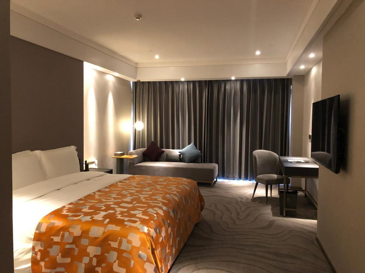 Ximala Business Hotel Guangzhou Exteriör bild
