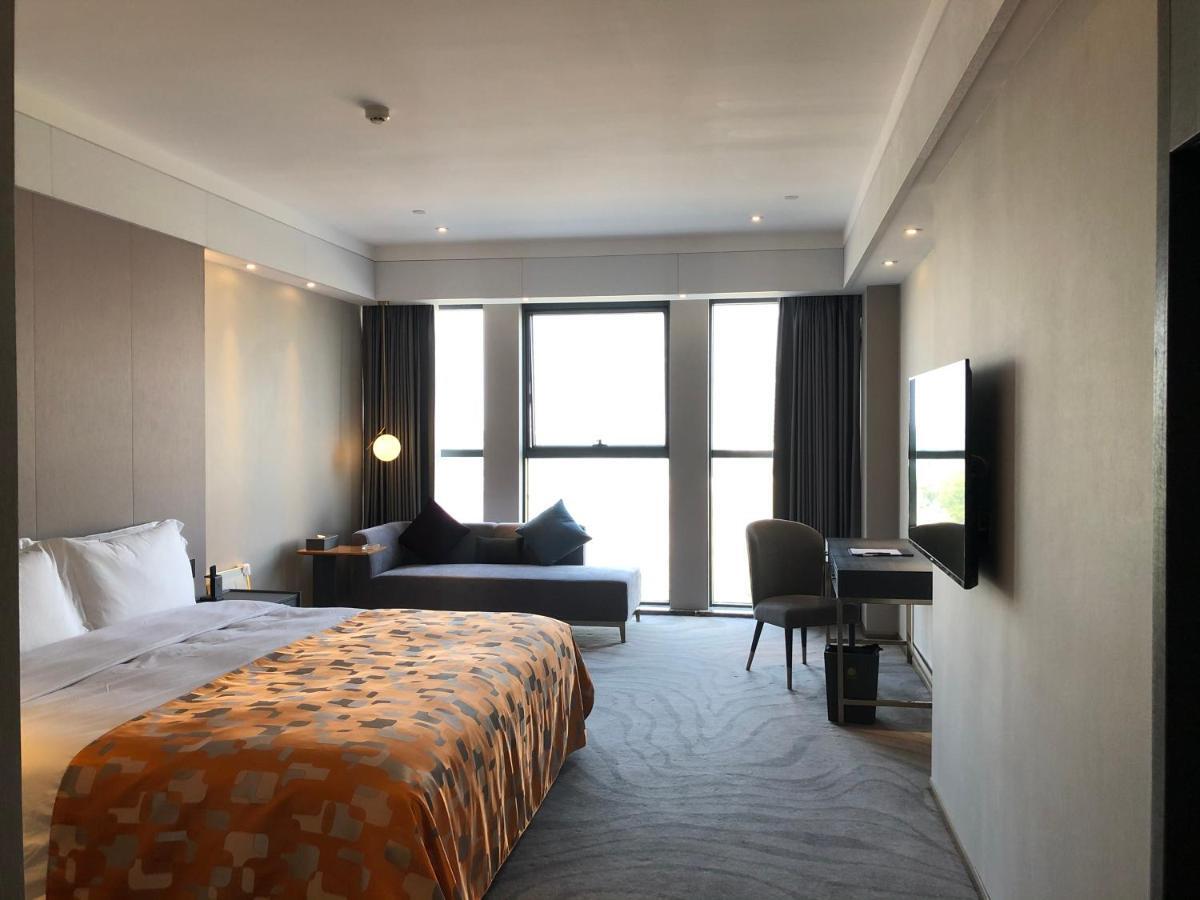 Ximala Business Hotel Guangzhou Exteriör bild