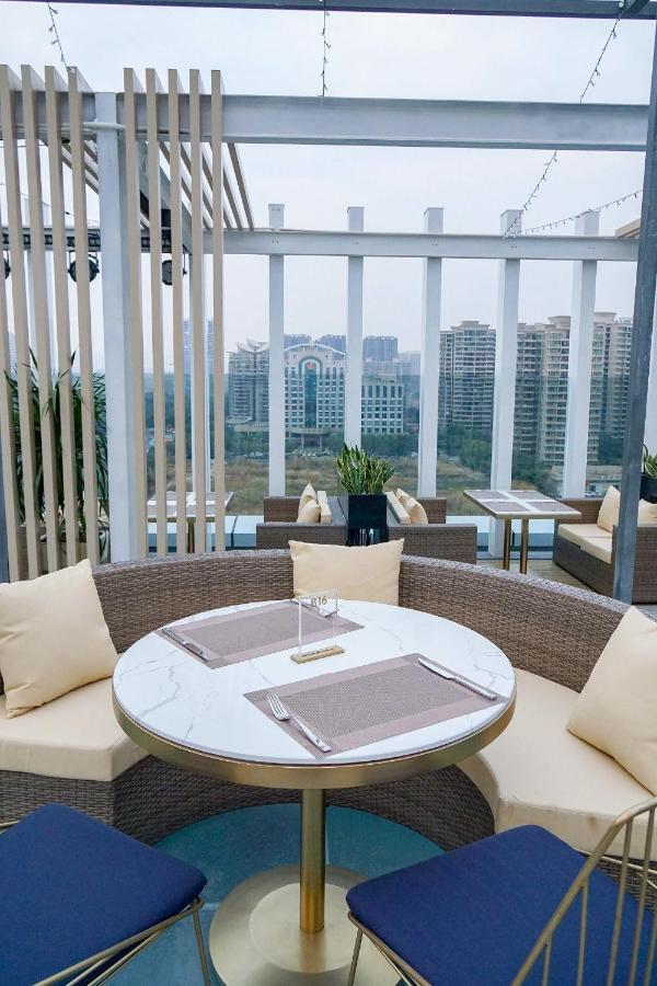 Ximala Business Hotel Guangzhou Exteriör bild